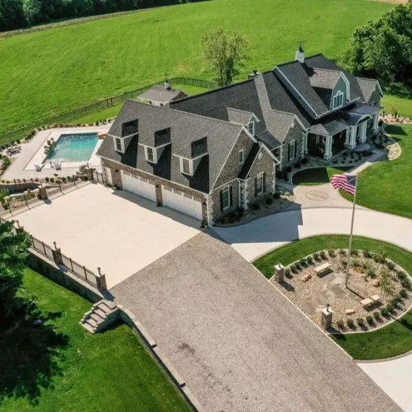 Custom home with pool and landscaping built by Padgett